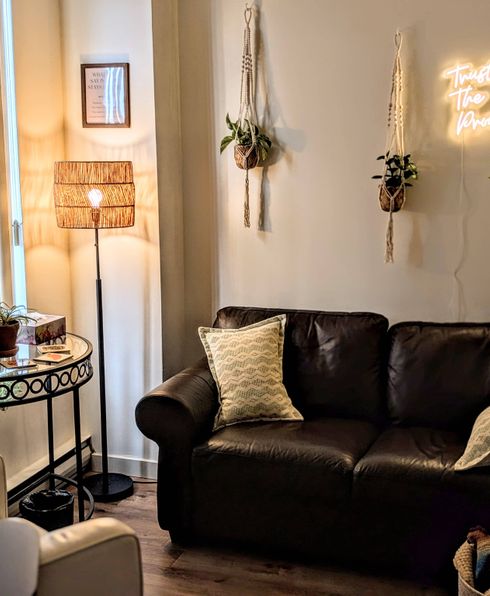 a comfortable couch with warm lighting